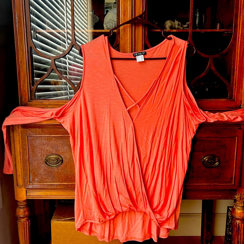 Light peach blouson banded top with cold shoulders. Loose in the front